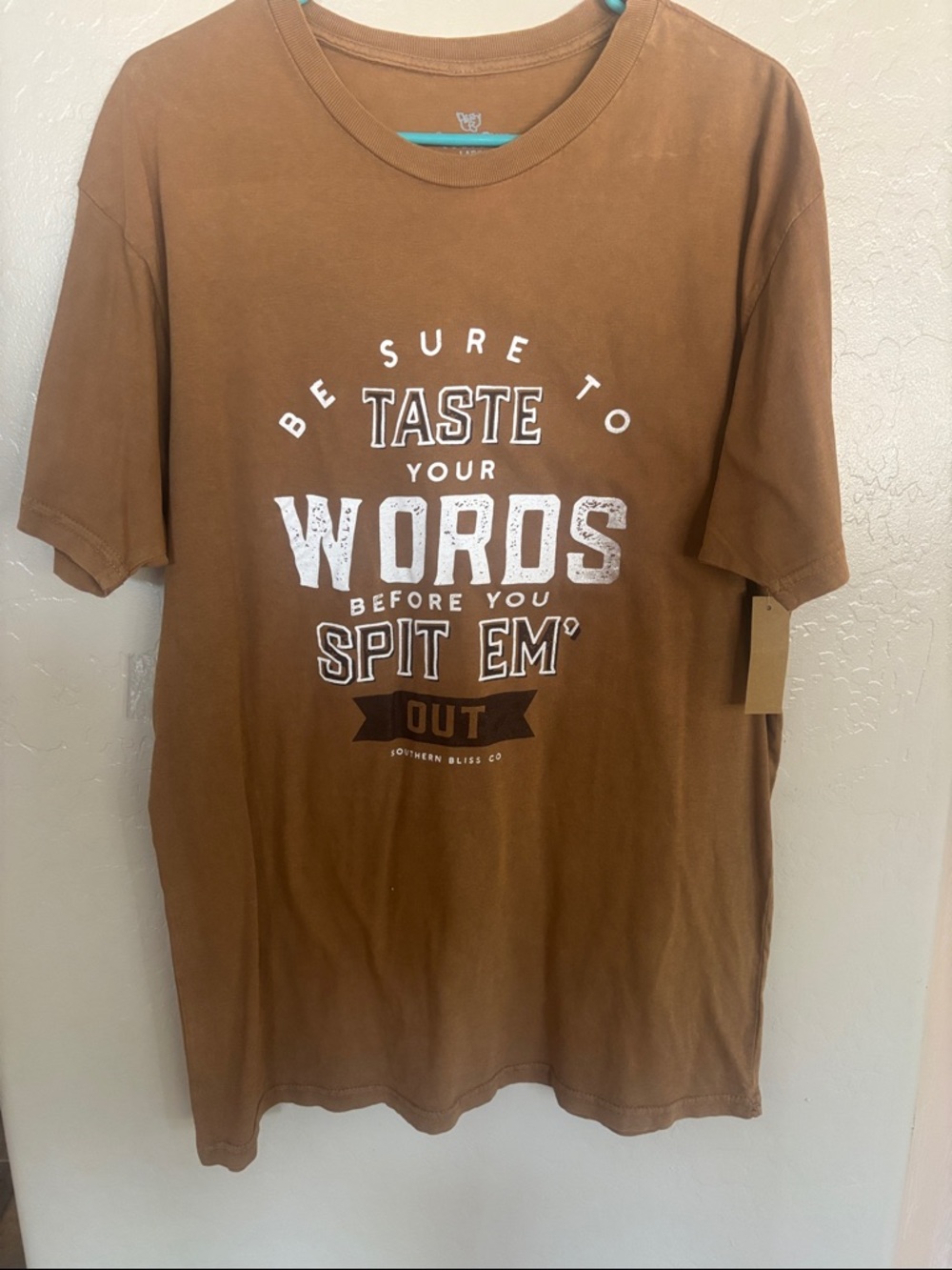 Women’s Brown Graphic Tee - "Taste Your Words"
